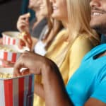 ADA requires movie theaters to provide closed captioning and audio description.