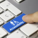 Keyboard with a blue key that says accessibility. A Brief History of Accessibility Law in the U.S. ; accessibility laws