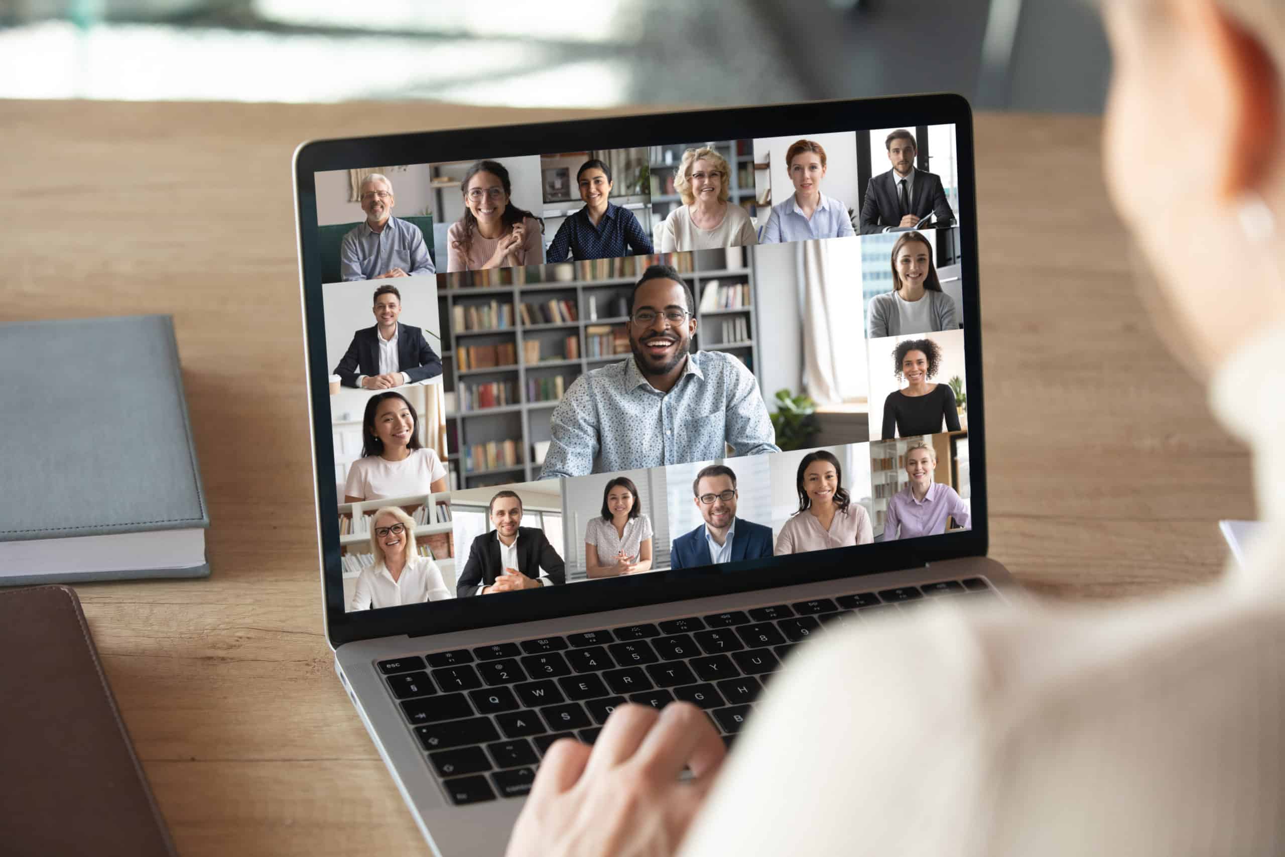 Employees speak on video conference with video captions and transcripts