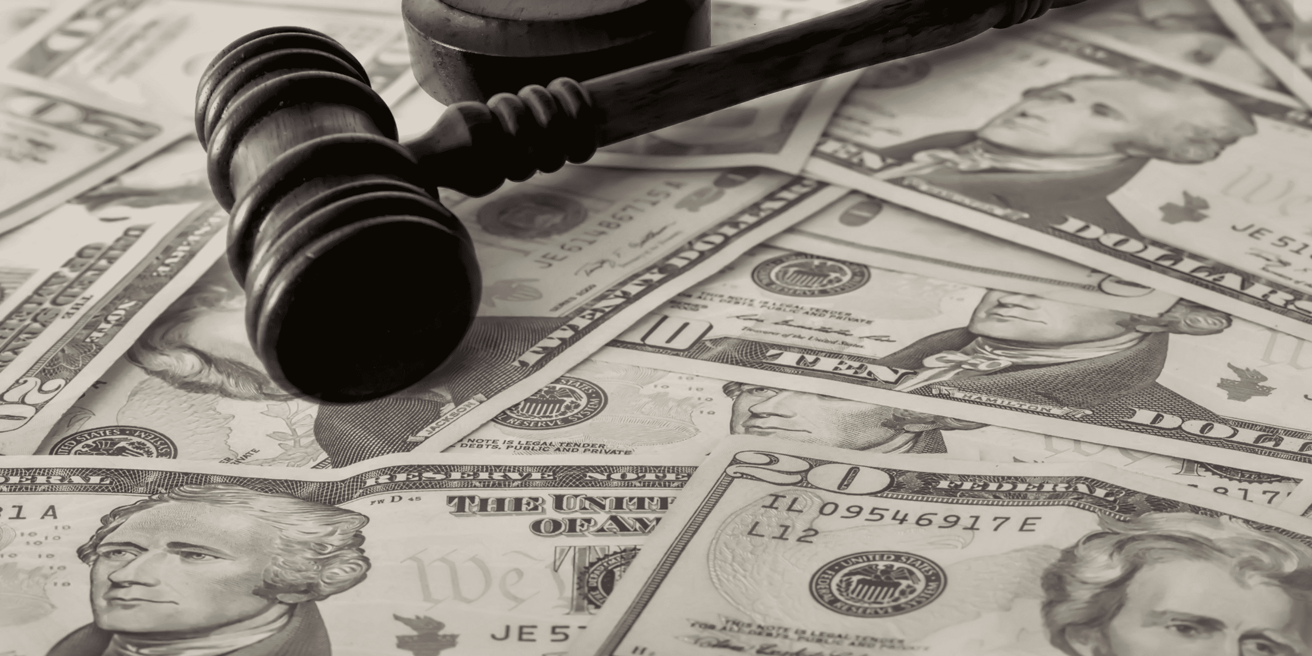 Accessibility Lawsuits - Gavel on top of U.S. Dollars