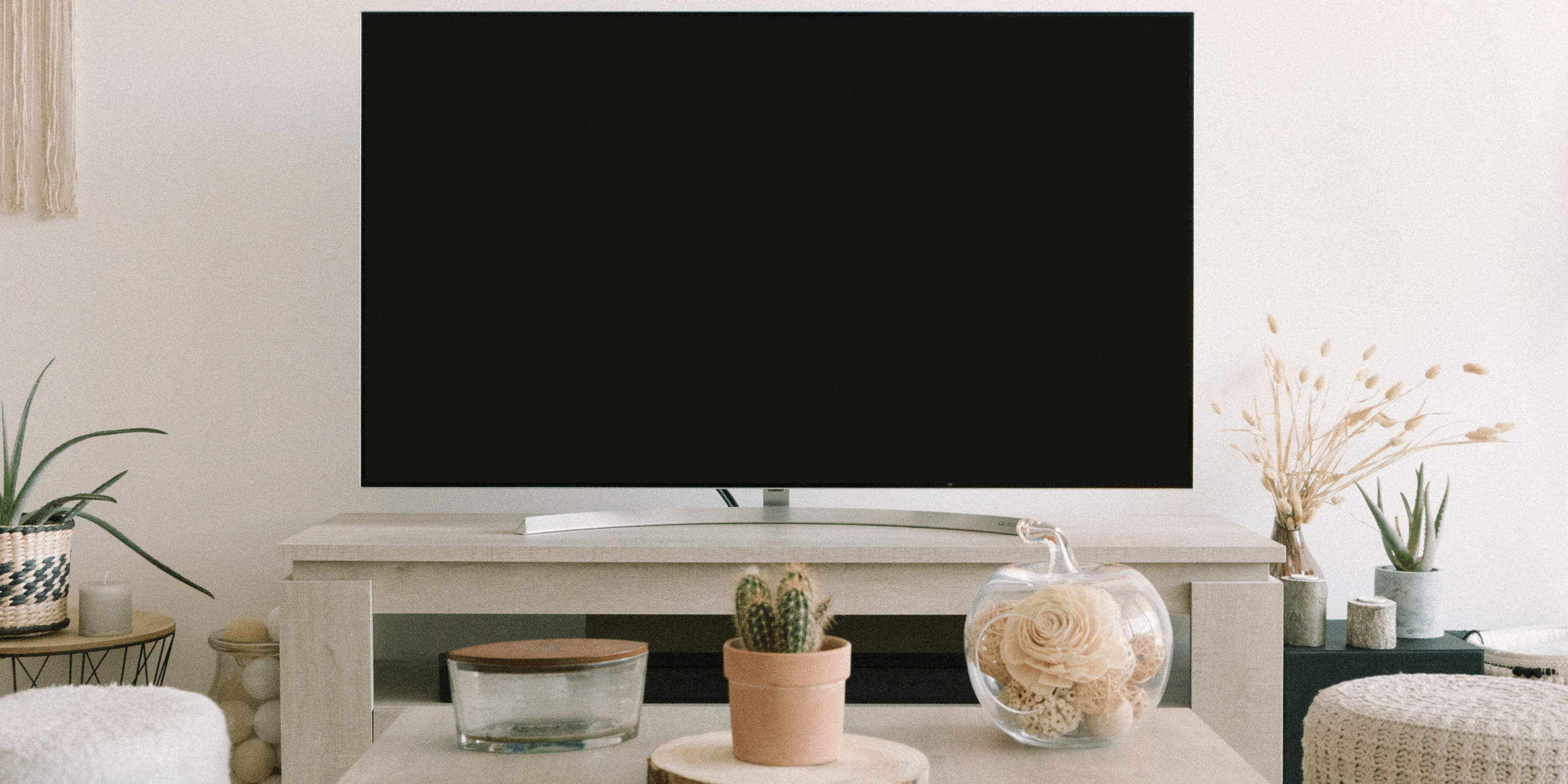 Television in front of coffee table